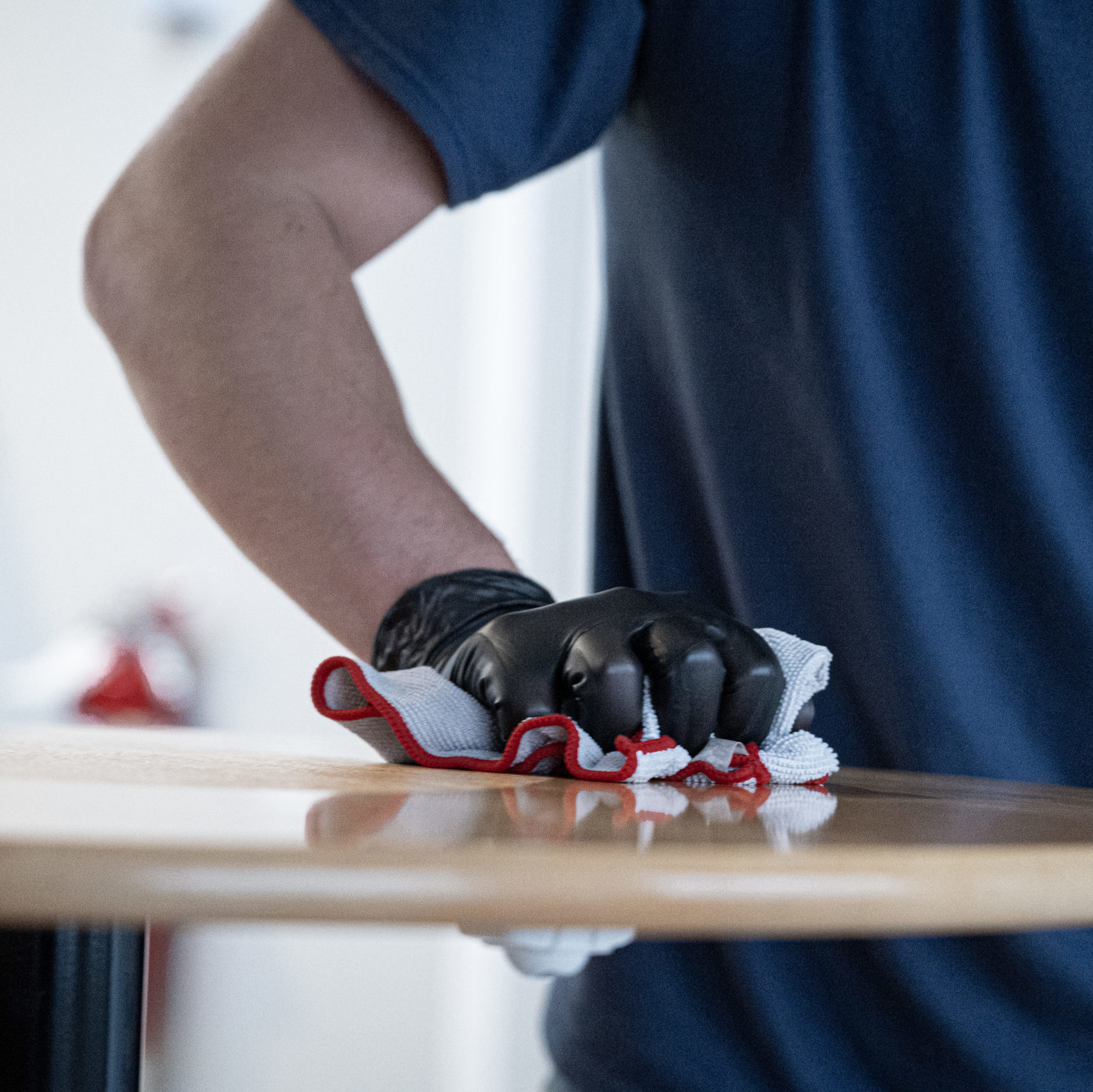 Cummins Facility Services Team: Employee Cleaning Table