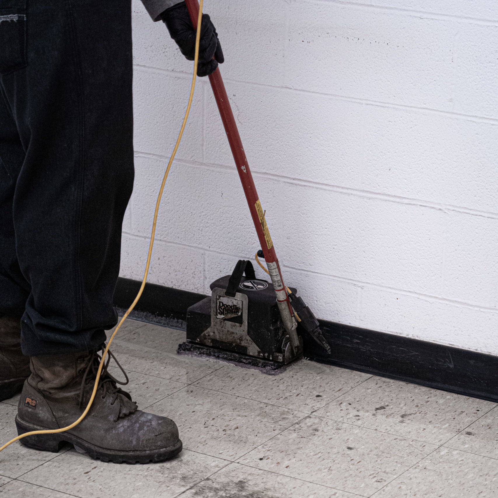 Cummins Facility Services Team: Employee Cleaning Floor