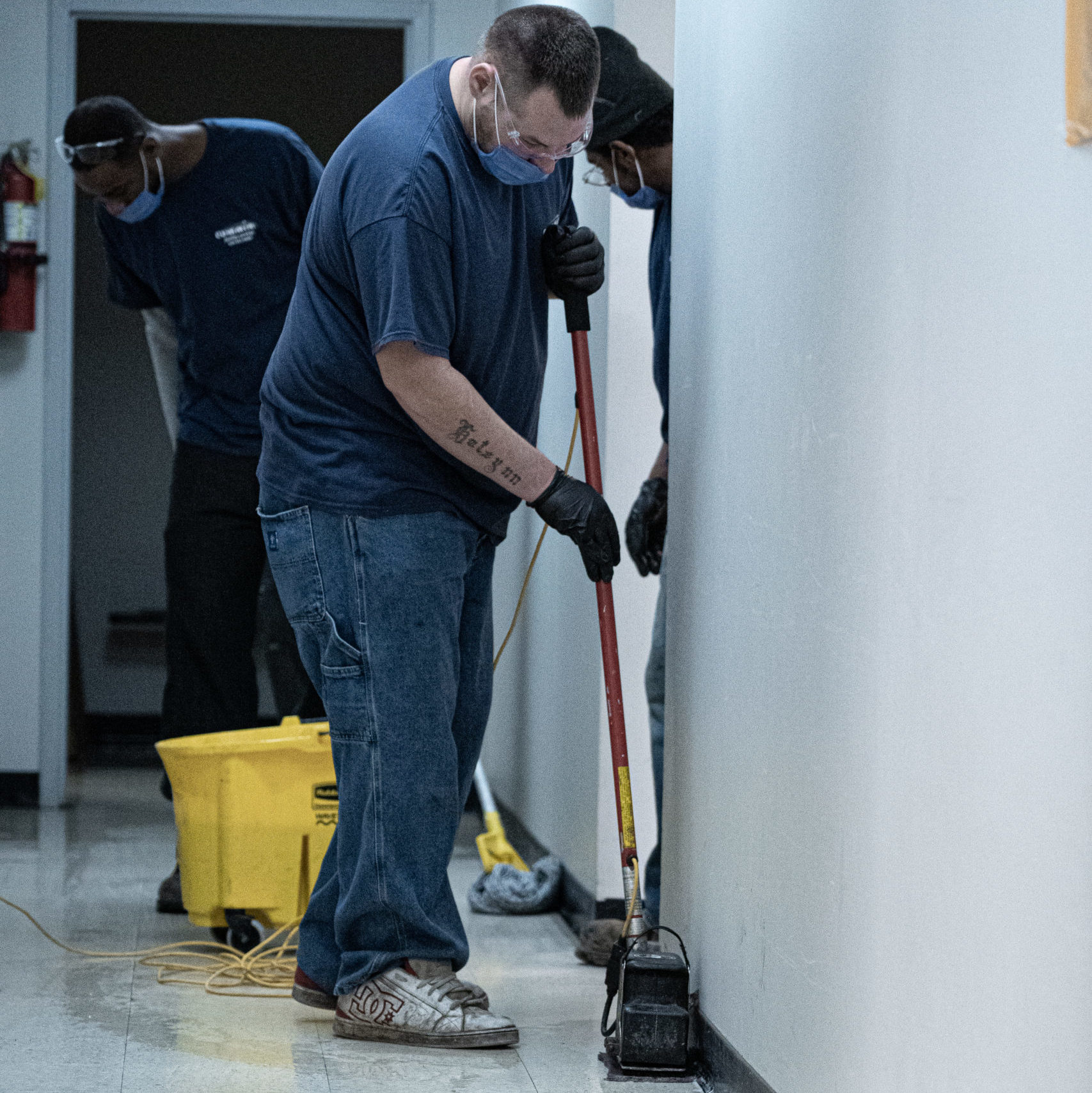 Cummins Facility Services Team: Employee Cleaning Floor